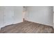 A bedroom shows laminate flooring, white paint, and white doors at 1636 Red Leaf Dr, Fort Mill, SC 29715