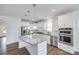Bright kitchen with stainless steel appliances and stone countertops at 1636 Red Leaf Dr, Fort Mill, SC 29715