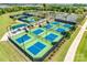 Several outdoor pickleball courts with green and blue surfaces and black netting at 1636 Red Leaf Dr, Fort Mill, SC 29715