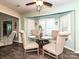 Cozy breakfast nook with a glass table, surrounded by shuttered windows for natural light at 202 Cameron Dr, Kings Mountain, NC 28086