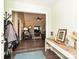 Inviting entryway with wood floors, light green walls, and a view into the spacious living room at 202 Cameron Dr, Kings Mountain, NC 28086