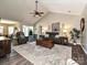 Spacious living room featuring vaulted ceilings, wood flooring, and comfortable seating at 202 Cameron Dr, Kings Mountain, NC 28086