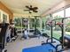 Bright sunroom with large windows, perfect for a home gym or relaxation at 202 Cameron Dr, Kings Mountain, NC 28086