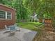 Charming backyard with patio, seating, and play area is perfect for outdoor entertaining and play at 2222 Wilmore Dr, Charlotte, NC 28203
