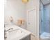 Chic bathroom with double vanity and frameless glass shower at 2222 Wilmore Dr, Charlotte, NC 28203