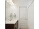 Clean bathroom with a large mirror, modern lighting, and a shower/tub combination at 2222 Wilmore Dr, Charlotte, NC 28203