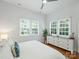 Bright bedroom features a large window and a decorative dresser at 2222 Wilmore Dr, Charlotte, NC 28203