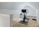 Bright exercise room with vaulted ceilings and bike offers a great workout area at 2222 Wilmore Dr, Charlotte, NC 28203
