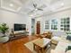Bright living room boasts hardwood floors, coffered ceilings, and large windows at 2222 Wilmore Dr, Charlotte, NC 28203