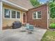 Outdoor patio with seating and grill, perfect for relaxing and entertaining with friends at 2222 Wilmore Dr, Charlotte, NC 28203