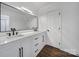 Modern bathroom featuring double sink vanity with black hardware, sleek lighting, and a large mirror at 263 Fairway Cir, Rock Hill, SC 29730