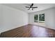 Bright bedroom featuring hardwood floors and a ceiling fan for added comfort at 263 Fairway Cir, Rock Hill, SC 29730