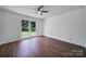 Bright, comfortable bedroom featuring hardwood floors and a large window at 263 Fairway Cir, Rock Hill, SC 29730