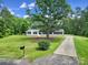 Beautiful home on a large lot with a long driveway, providing ample space and privacy at 263 Fairway Cir, Rock Hill, SC 29730