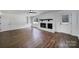 Cozy living room with brick fireplace, built-in shelving, and abundant natural light at 263 Fairway Cir, Rock Hill, SC 29730