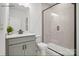 Modern bathroom features a sleek vanity with storage, and a glass-enclosed shower at 2658 Headwind Ct # 245, Belmont, NC 28012