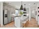 Modern kitchen featuring stainless steel appliances, a kitchen island, and a sink with a window at 2658 Headwind Ct # 245, Belmont, NC 28012