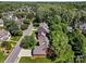Aerial view showcases the neighborhood, mature trees, and well-maintained lawns at 3124 17Th Street Ne Ln, Hickory, NC 28601