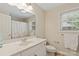 Bright bathroom has a large vanity, toilet, and shower/tub combination at 3124 17Th Street Ne Ln, Hickory, NC 28601