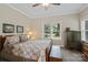 Cozy bedroom featuring natural light from the window and neutral wall paint at 3124 17Th Street Ne Ln, Hickory, NC 28601