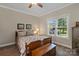 Inviting bedroom with a window, and a ceiling fan for year round comfort at 3124 17Th Street Ne Ln, Hickory, NC 28601