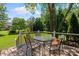 Relaxing deck space with outdoor table and chairs for dining al fresco at 3124 17Th Street Ne Ln, Hickory, NC 28601