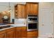 Kitchen featuring stainless steel appliances, custom cabinets, and quartz countertops at 3124 17Th Street Ne Ln, Hickory, NC 28601