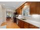 This kitchen features custom cabinets, stainless steel appliances, and an eat-in bar at 3124 17Th Street Ne Ln, Hickory, NC 28601