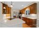 Kitchen featuring stainless steel appliances, tile backsplash, wood cabinets, and eat-in bar at 3124 17Th Street Ne Ln, Hickory, NC 28601