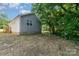 Exterior side view of home showcasing vinyl siding and backyard space at 314 Adams St, Salisbury, NC 28144