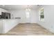 Bright dining area features granite counters, stainless steel appliances and a modern chandelier at 314 Adams St, Salisbury, NC 28144