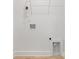 Interior laundry room with washer and dryer hookups and white shelving at 314 Adams St, Salisbury, NC 28144
