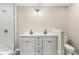 Modern bathroom featuring a double vanity, sleek fixtures, and a marble-tiled shower at 316 Fulton St, Kings Mountain, NC 28086