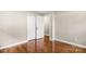 Bedroom featuring hardwood floors, neutral paint and ample closet space at 316 Fulton St, Kings Mountain, NC 28086