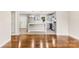 Open-concept kitchen with modern appliances, gray cabinetry, white countertops and island with wood flooring at 316 Fulton St, Kings Mountain, NC 28086