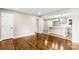 Inviting living room with gleaming hardwood floors, fresh paint, and a seamless open floor plan at 316 Fulton St, Kings Mountain, NC 28086