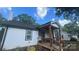 Cozy home featuring a quaint covered porch and a well-maintained, neutral exterior at 319 Leonard Ave, Albemarle, NC 28001