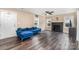 Inviting living room showcases a decorative fireplace, wood-look flooring, and natural light at 319 Leonard Ave, Albemarle, NC 28001