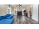 Bright living room features modern floors, a stone fireplace, and ample natural light at 319 Leonard Ave, Albemarle, NC 28001
