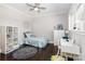bedroom featuring a bed, white shelving and a window with natural light at 324 Squash Harvest Ct, Matthews, NC 28104