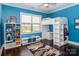 Vibrant bedroom with a loft bed and playful decor and storage at 324 Squash Harvest Ct, Matthews, NC 28104