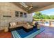 Covered outdoor living space features a vaulted ceiling, outdoor seating and pool view at 324 Squash Harvest Ct, Matthews, NC 28104