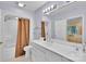 Elegant bathroom with double vanity, large mirror, and shower at 331 Glen Oaks Rd, Charlotte, NC 28270