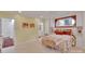 Bright bedroom featuring built-in cabinets, a large bed, and natural light at 331 Glen Oaks Rd, Charlotte, NC 28270