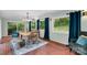 Bright dining room with large windows and classic chandelier at 331 Glen Oaks Rd, Charlotte, NC 28270