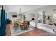 Open dining area with views into the living room, bathed in natural light at 331 Glen Oaks Rd, Charlotte, NC 28270