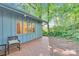 Exterior view featuring a brick patio and verdant landscaping at 331 Glen Oaks Rd, Charlotte, NC 28270
