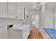 Laundry room with sink, upper cabinets, and a laundry area at 331 Glen Oaks Rd, Charlotte, NC 28270