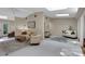 Spacious living room features neutral walls, skylight, and plush carpeting at 331 Glen Oaks Rd, Charlotte, NC 28270