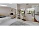 Open-concept living space featuring fireplace, bar, and seamlessly connected rooms at 331 Glen Oaks Rd, Charlotte, NC 28270